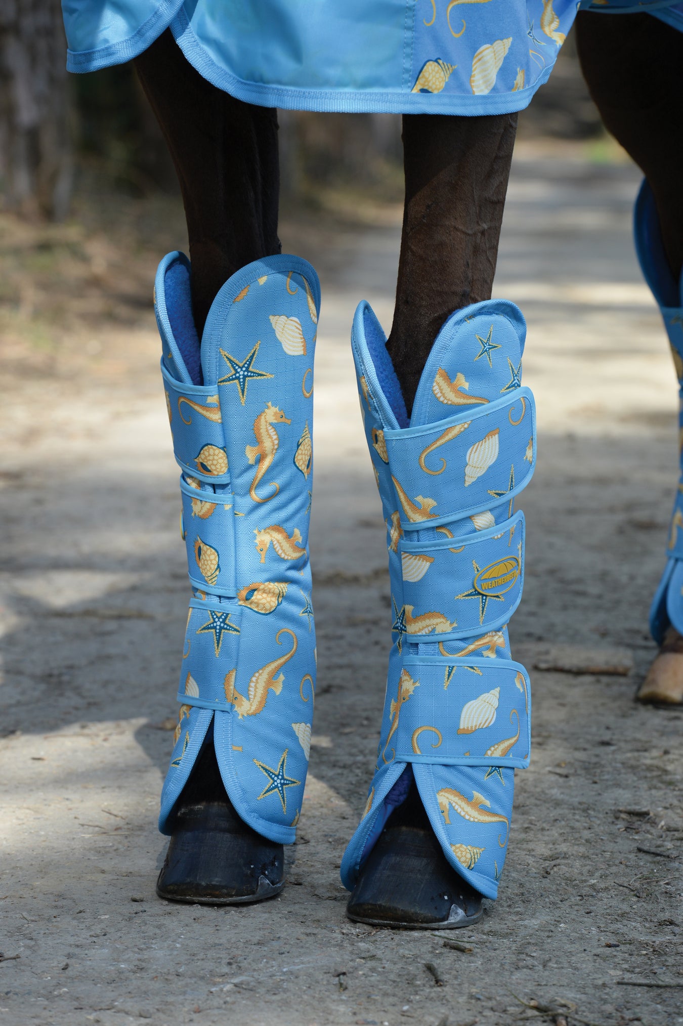 WeatherBeeta 1200D Wide Tab Long Travel Boots in Seahorse Print - Front Legs from Front