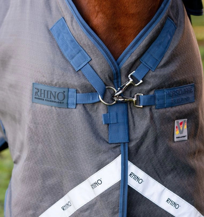 Rhino Plus Hexstop Vari-Layer Turnout Sheet (0g Light, 0g Hood) in Grey with Indigo and Navy Trim - Closeup of v-neck front closure