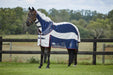 WeatherBeeta Breeze With Surcingle IV Combo Neck Summer Sheet (No Fill) in White with Navy and Red Trim - Horse in Field