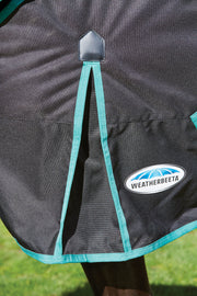 WeatherBeeta Green-Tec 900D Plus Standard Neck Turnout Blanket (50g Medium-Lite) in Black with Bottle Green Trim - Shoulder Gusset